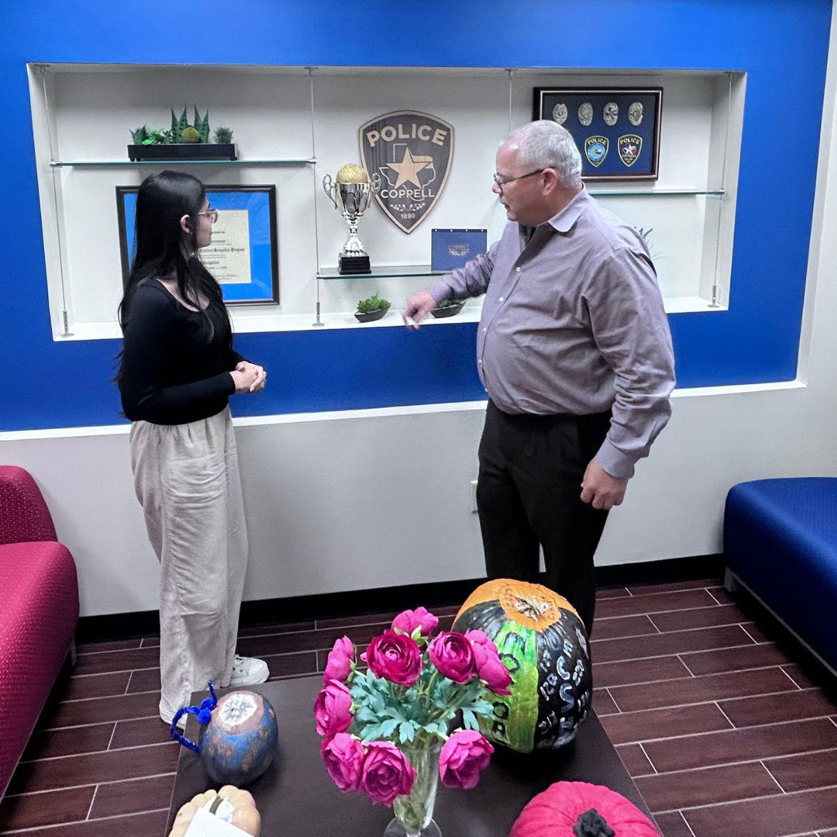 Charvi presenting TexAi to the Chief